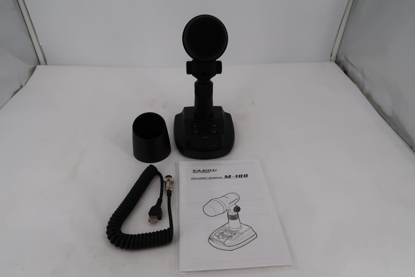 Yaesu M-100 complete set with stand, spare windscreen, coiled cable, and original manual