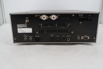 Kenwood TS-870S rear panel showing dual antenna ports, IF Out, ACC, COM, RTTY, KEY, PADDLE, and GND connections